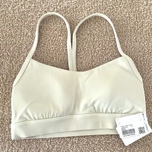 Lulu lemon. NWT. Women flow Y bra. Size 4. Bone color